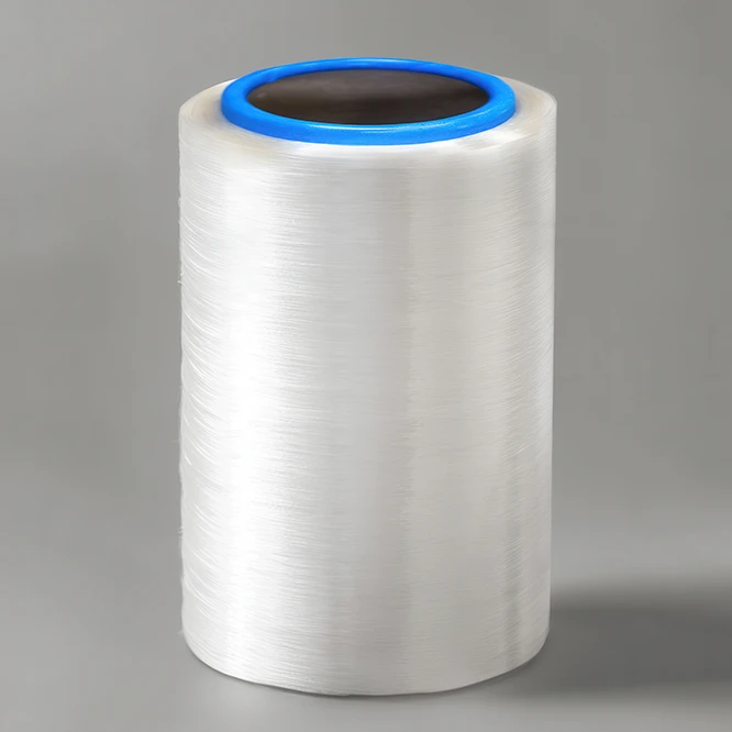 Roll with transparent filament on a gray background (Photo)